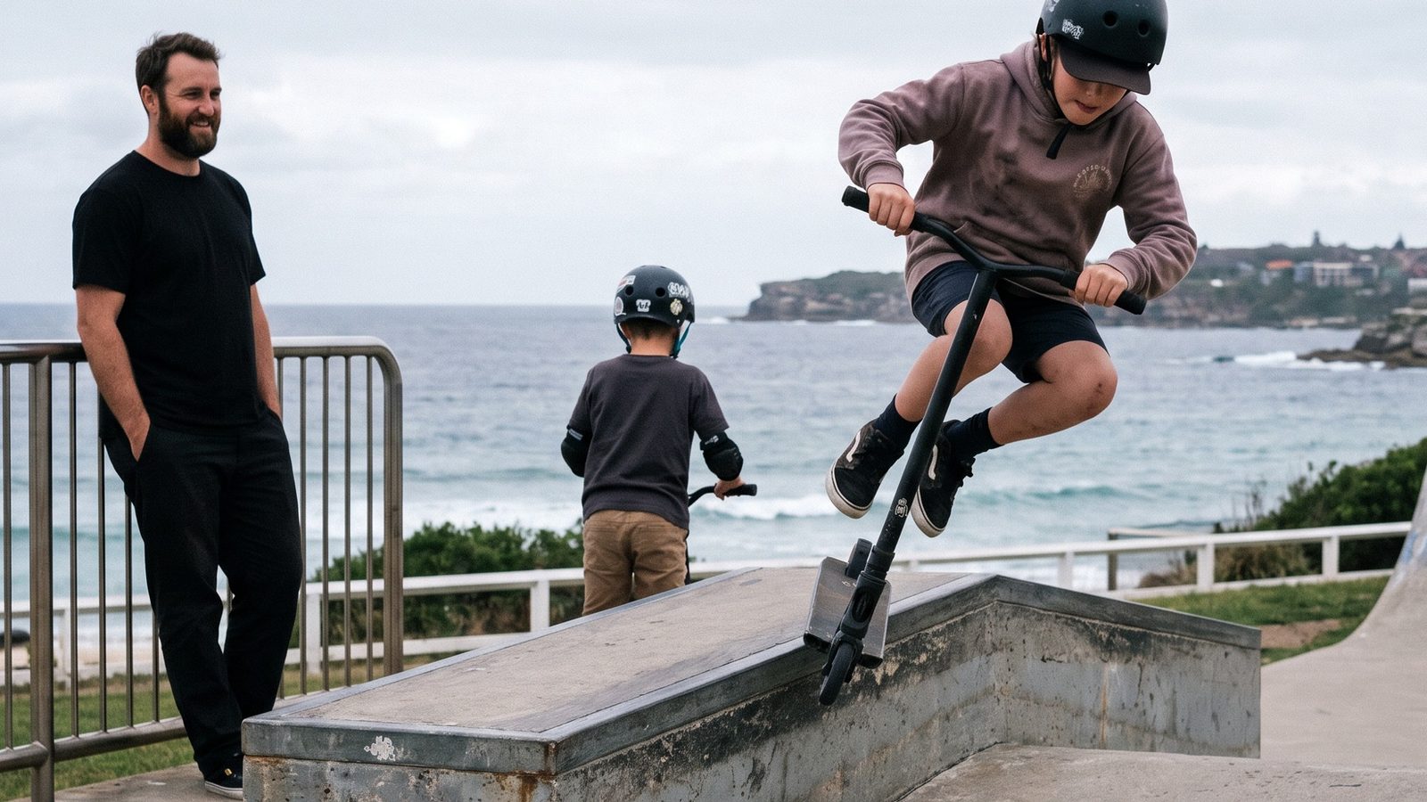 Children riding scooters outside the WAYS centre in North Bondi